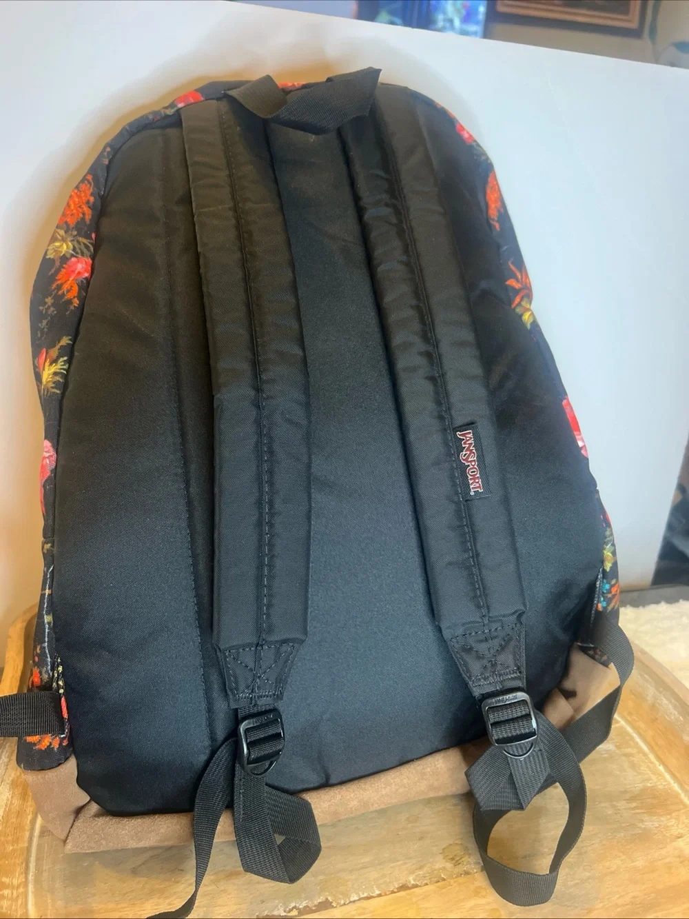 Jansport Black Floral Backpack with Pink and Orange Blooms